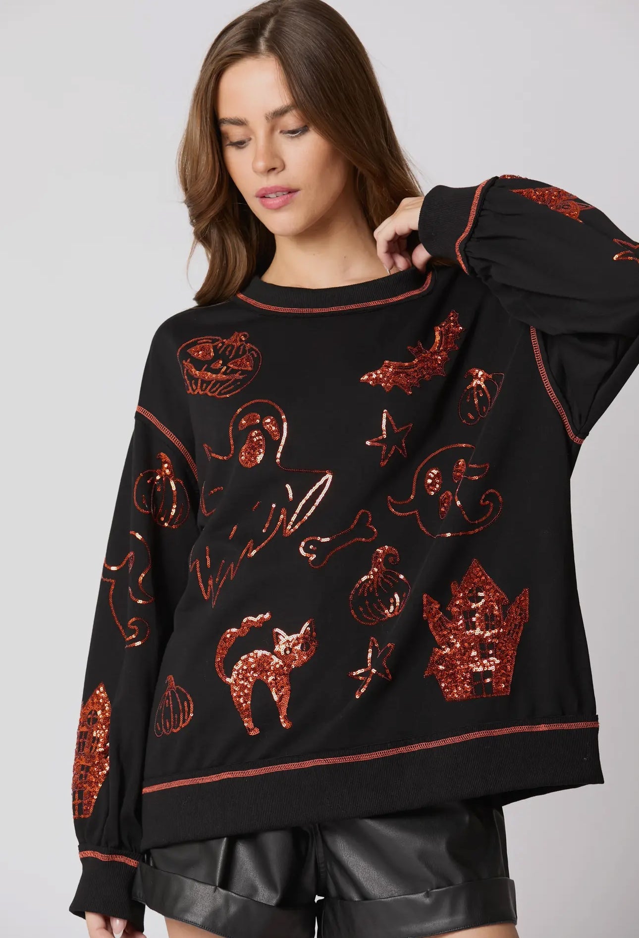 MUSTA Halloween 🎃 paljetein koristeltu toppi, heti toimitettavissa