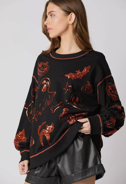 MUSTA Halloween 🎃 paljetein koristeltu toppi, heti toimitettavissa
