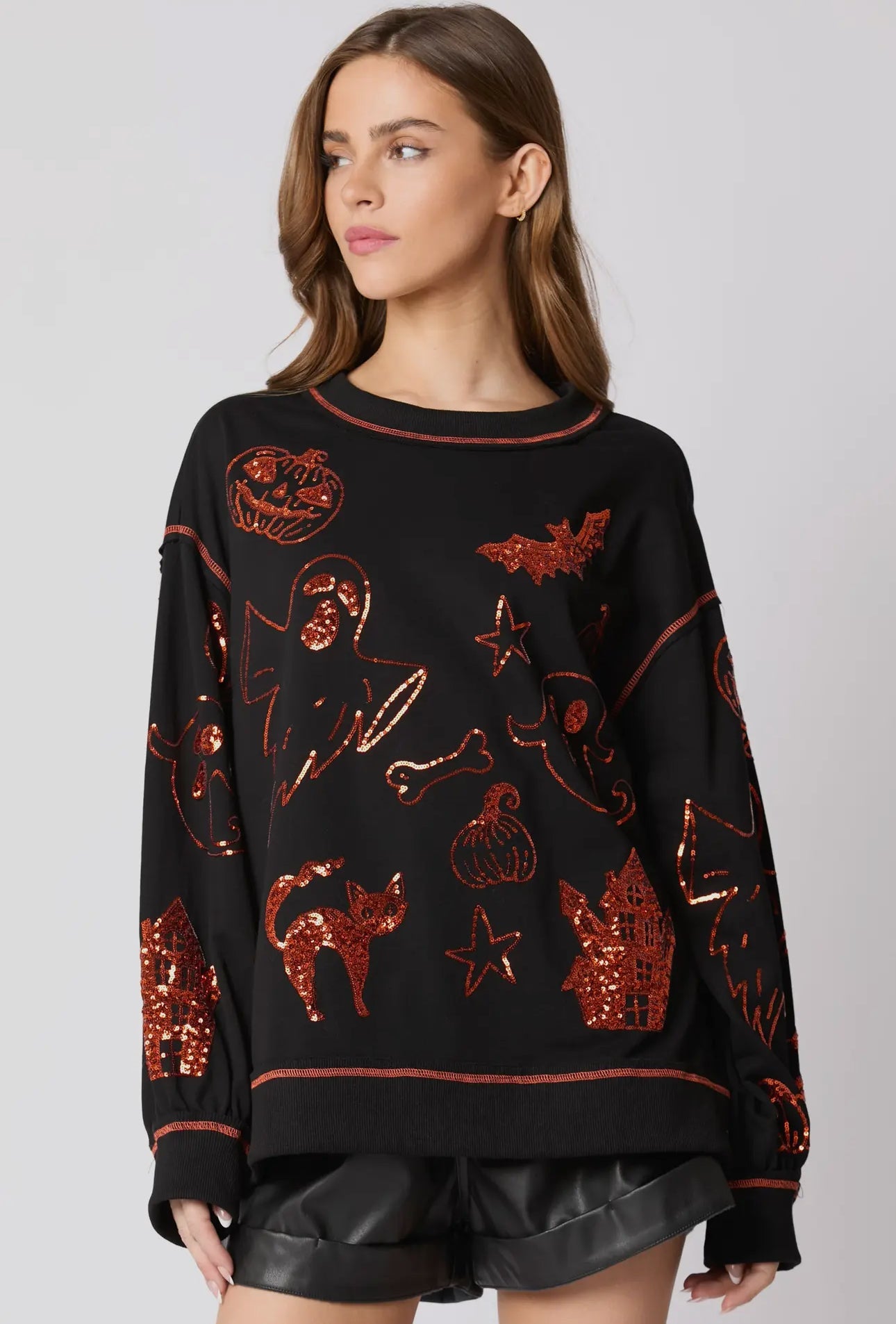 MUSTA Halloween 🎃 paljetein koristeltu toppi, heti toimitettavissa