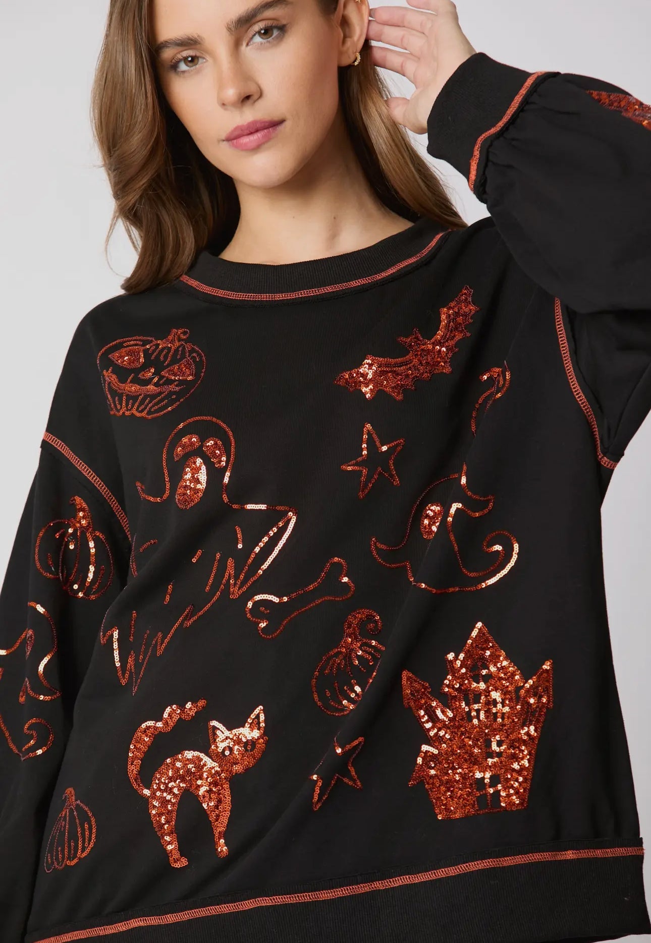 MUSTA Halloween 🎃 paljetein koristeltu toppi, heti toimitettavissa