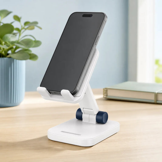 PIMOVO foldable phone stand holding an unbranded phone on a bright desk